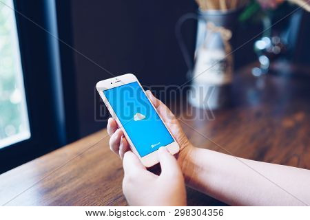 Chiang Mai, Thailand - Apr.08,2019: Woman Holding Apple Iphone 6s Rose Gold With Onedrive On Screen.