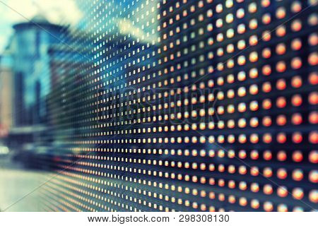 Reflection Of The Street In The Screen Of The Lamps Of An Advertising Stand With A Perspective