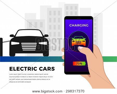 Smartphone In Hand With Information About The Status Of The Charge Of Your Electric Car. Against The