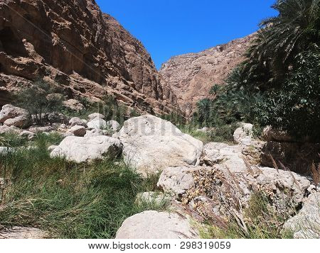 Wadi Shab,amazing Canyon With Stone Cliffs And Fresh Clean Water,sultanate Of Oman
