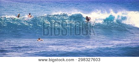 Hossegor, France - February Circa , 2019. An Unidentified Surfer Man Catching Riding On An Ocean Wav