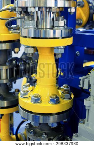 Steel Pipeline With Flanges. The Flanges Are Fastened With Powerful Bolts With Nuts.