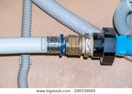 Connection Of Plastic Pipes Through The Coupling. Plumbing Water Supply