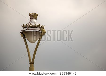 Beautiful Vintage Street Lamp Of The Colonial Town Of Iza, Photographed Against The Overcasted Sky, 
