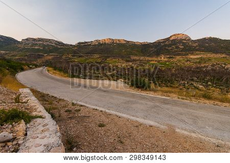 Road To Small Village Trstenik In Peljesac Peninsula, With Mountins And Blue Sky As Background