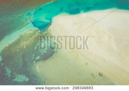Aerial View Of City Of Nin. Summer Time In Dalmatia Region Of Croatia. Coastline And Turquoise Water