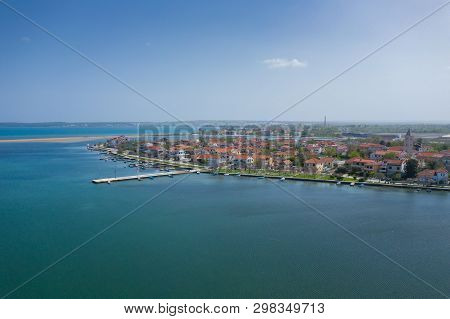 Aerial View Of City Of Nin. Summer Time In Dalmatia Region Of Croatia. Coastline And Turquoise Water