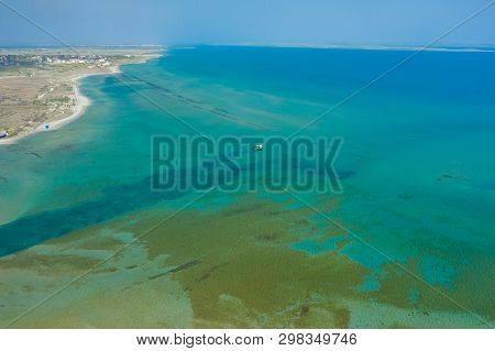 Aerial View Of City Of Nin. Summer Time In Dalmatia Region Of Croatia. Coastline And Turquoise Water