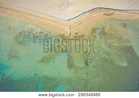 Aerial View Of City Of Nin. Summer Time In Dalmatia Region Of Croatia. Coastline And Turquoise Water