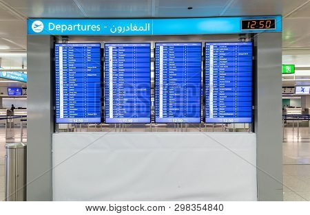 Dubai, Uae - April 2. 2019. Departure Scoreboard It Dxb International Airport