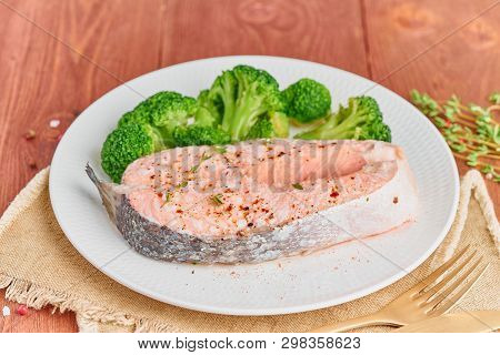 Steam Salmon And Vegetables, Paleo, Keto, Fodmap Diet. White Plate On A Rustic Wooden Table, Side Vi