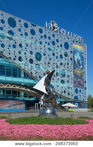 Moscow, Russia - August 14, 2018: Sculpture Of Dolphins Near The Building 