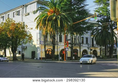 Sukhum, Abkhazia, - 03 January, 2013: City Street With Cars, Palm Trees.