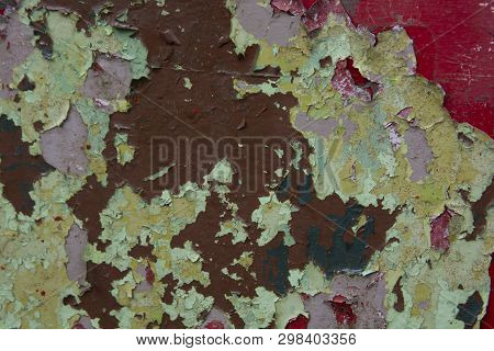 Cracked And Peeling Colorful Paint, Grunge Old Wall Texture. Tempalte For Design. Copy Space.