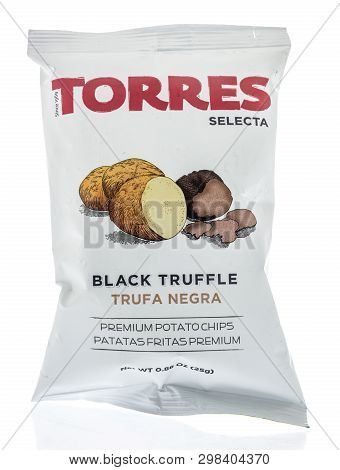 Winneconne, Wi -  28 April 2019: A Package Of Torres Selcta Black Truffle Chips On An Isolated Backg