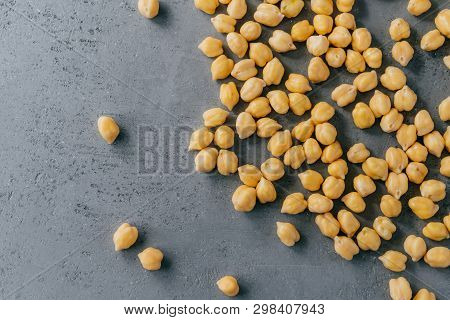 Plant Based Protein. Raw Fresh Chickpeas On Grey Background. Organic Food. Ready To Eat. Healthy Nut