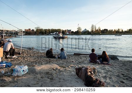 Vancouver, Bc, Canada - Apr 20, 2019: A Homeless Man Sleeping On The Beach At The 420 Festival In Va