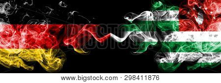 Germany Vs Abkhazia, Abkhazian Smoky Mystic Flags Placed Side By Side. Thick Colored Silky Smoke Fla