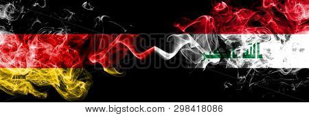 Germany Vs Iraq, Iraqi Smoky Mystic Flags Placed Side By Side. Thick Colored Silky Smoke Flags Of De