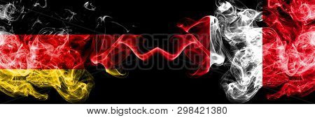 Germany Vs Peru, Peruan Smoky Mystic Flags Placed Side By Side. Thick Colored Silky Smoke Flags Of D