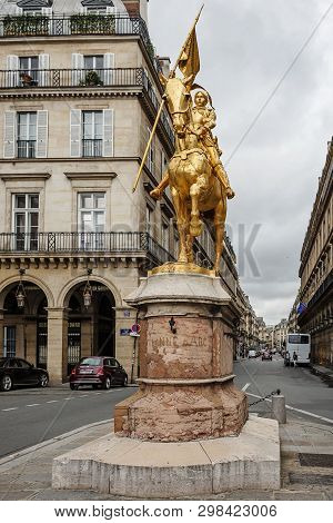 Paris, France - 08 August, 2017: A Gilded Bronze Equestrian Sculpture Of Joan Of Arc By Emmanuel Fre