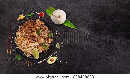 Pad thay asian food background with various ingredients on rustic stone background , top view. Vietnam or Thai cuisine.