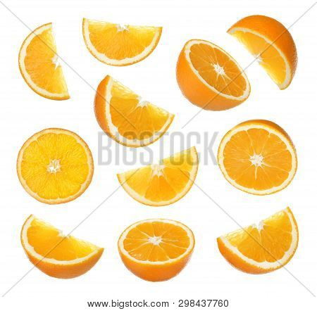 Set Of Cut Ripe Juicy Oranges On White Background