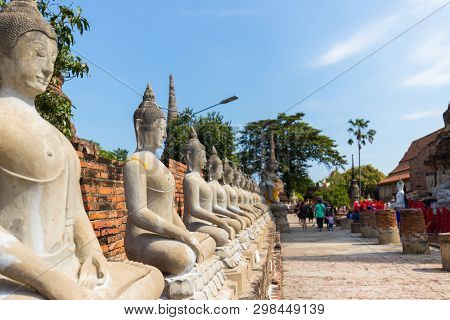 People Visiting The Temple Of Ayutthaya Historical Park On Thailand.