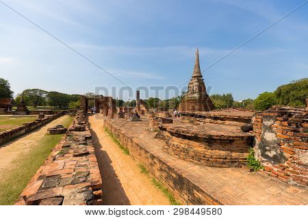 People Visiting The Temple Of Ayutthaya Historical Park On Thailand..