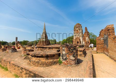 People Visiting The Temple Of Ayutthaya Historical Park On Thailand..