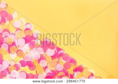 Orange, Pink And White Confetti On Orange Background.  Flat Lay Style. Top View. Copyspace For Text.
