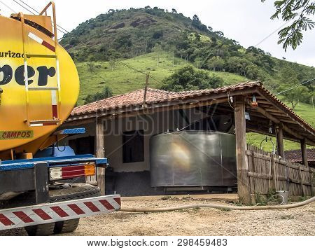 São Francisco Xavier, Sao Paulo, Brazil, January 27, 2006. Refrigerated Truck Collects Milk In A Sma