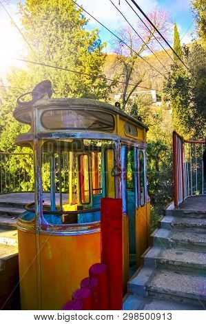 Old Rusty Abandoned Cable Car Cabin In Tquarchal .tkvarcheli. Abkhazia, Georgia.