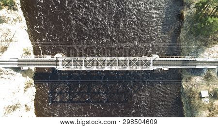 Aerial View On The Rail Bridge Across The River In Rural Place In Spring