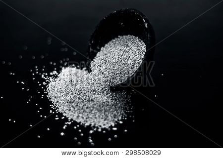 Close Up Of Clay Bowl On Wooden Surface Full Of Poppy Seeds Or Khus Or Opium Poppy Or Breadseed Popp