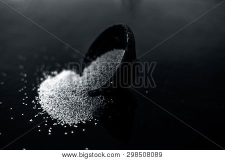 Close Up Of Clay Bowl On Wooden Surface Full Of Poppy Seeds Or Khus Or Opium Poppy Or Breadseed Popp