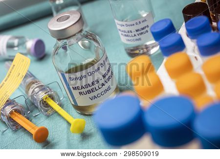 Different Vials Of Triple Viral Vaccine Of Measles, Rubella And Mumps, Known As Mmr, Conceptual Imag