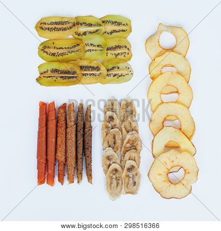Various Fruit Chips And Pastila On White Background. Assorted Dehydrated Apple, Banana, Kiwi Fruit C