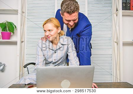 Create Greater Safety And Trust. Sexual Harassment At Work. Man And Woman Colleagues Flirt In Office