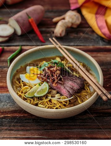 Mee Rebus Or Malaysian Boiled Noodles In Sweet Potato Gravy