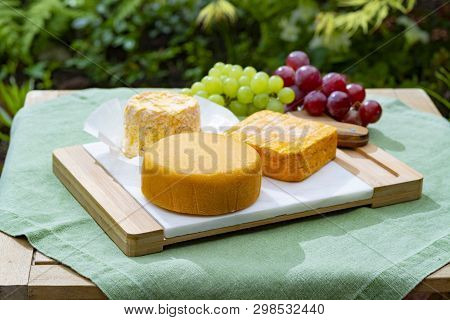 French Cheeses Collection, Riche De Saveurs, Langres And Le Peche Des Bons Peres Cheeses Served With