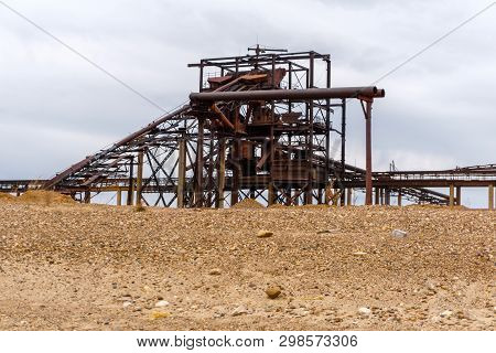 Desert Industrial Landscape With Stationary Rusty Gravitational Separator Of Sand And Gravel On The 
