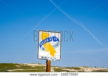Taft, California - March 25, 2019: Sign Reminding Drivers Of California Seatbelt Law - Click It Or T