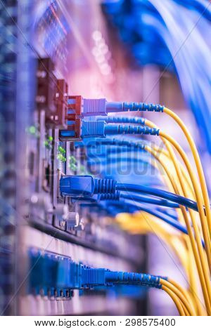 fiber network cable connecting on network core switch close up