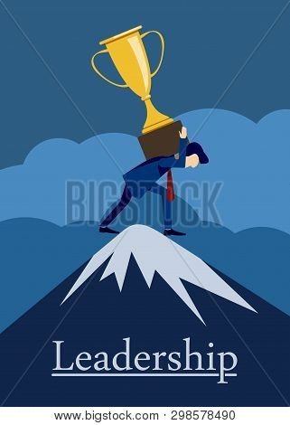 Leadership, A Businessman On Top Of A Mountain Carries A Prize Cup On His Shoulders