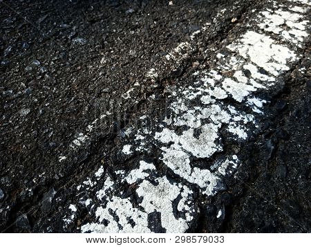 Road Traffic Paint On The Asphalt Surface And To Ensure Safety