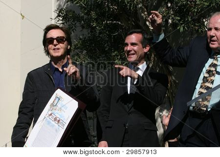 LOS ANGELES - FEB 9:  Paul McCartney, Eric Garcetti,  at the Hollywood Walk of Fame Ceremony for Paul McCartney at Capital Records Building on February 9, 2012 in Los Angeles, CA