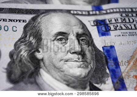 Close Up Portrait Of Benjamin Franklin On Hundred Dollar Baknote.