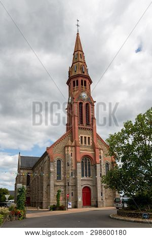 The Church In Saint-lyphard (france) On A Cloudy Day In Summer