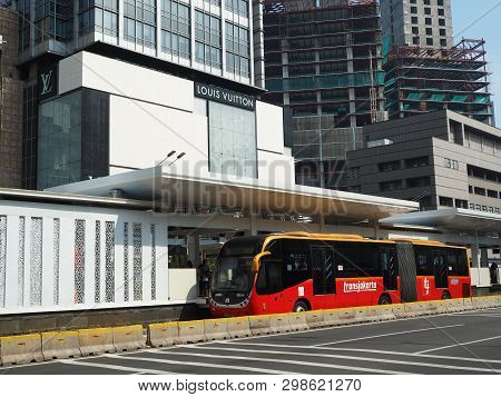 Jakarta, Indonesia - April 17, 2019: Transjakarta Bus Getting Some Passengers At Bundaran Hi Bus She
